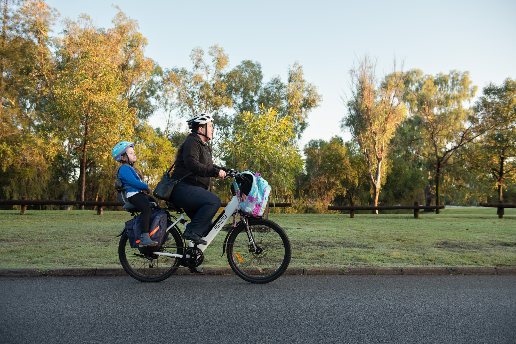 woman and child on an e-bike